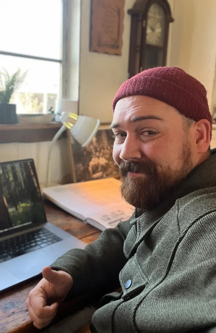 Aaron Salvato at his laptop